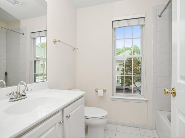 full bath with tile patterned floors, toilet, vanity, and shower / bathtub combination