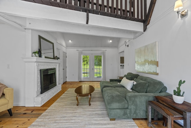37 Hungry Hill Cir, Guilford, CT 06437 - living room featuring hardwood / wood-style flooring, recessed lighting, french doors, a brick fireplace, and beam ceiling