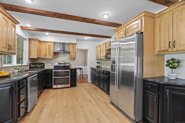 37 Hungry Hill Cir, Guilford, CT 06437 - kitchen featuring stainless steel appliances, wall chimney range hood, a sink, beam ceiling, and light wood finished floors