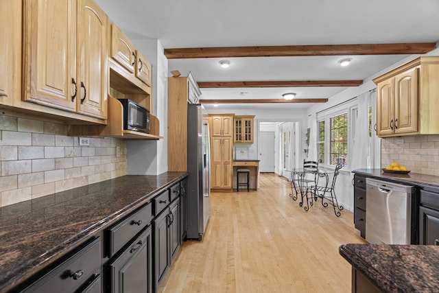 37 Hungry Hill Cir, Guilford, CT 06437 - kitchen featuring stainless steel appliances, light wood-style floors, backsplash, dark stone counters, and beam ceiling