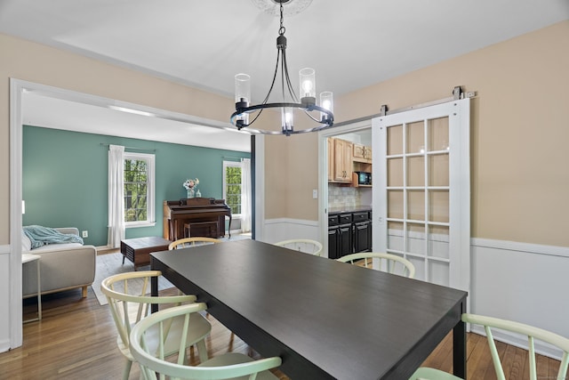 37 Hungry Hill Cir, Guilford, CT 06437 - dining space with a chandelier and wood finished floors