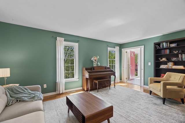 37 Hungry Hill Cir, Guilford, CT 06437 - living room featuring wood finished floors and baseboards