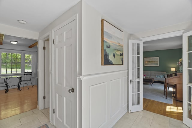 37 Hungry Hill Cir, Guilford, CT 06437 - corridor featuring french doors and light tile patterned floors
