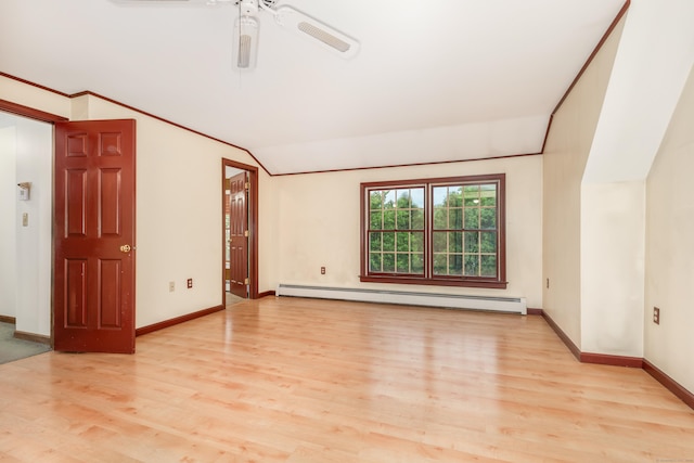 spare room with a baseboard radiator, wood finished floors, ceiling fan, baseboards, and lofted ceiling