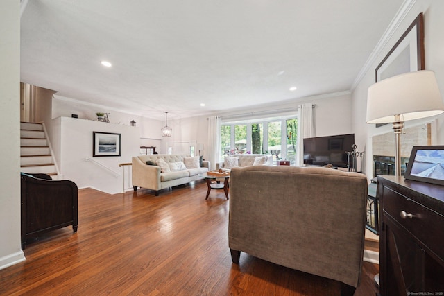 14 Live Oak Rd, Norwalk, CT 06851 - living area with ornamental molding, dark wood finished floors, recessed lighting, and stairway