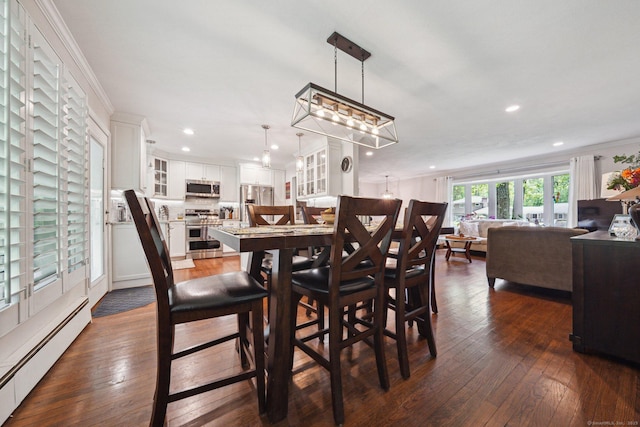 14 Live Oak Rd, Norwalk, CT 06851 - dining area featuring baseboard heating, recessed lighting, dark wood-style flooring, and ornamental molding