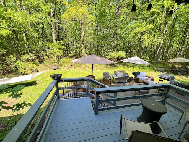 14 Live Oak Rd, Norwalk, CT 06851 - wooden terrace with grilling area, a lawn, and a view of trees
