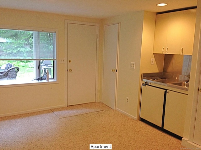 14 Live Oak Rd, Norwalk, CT 06851 - kitchen with white cabinets, light colored carpet, and recessed lighting