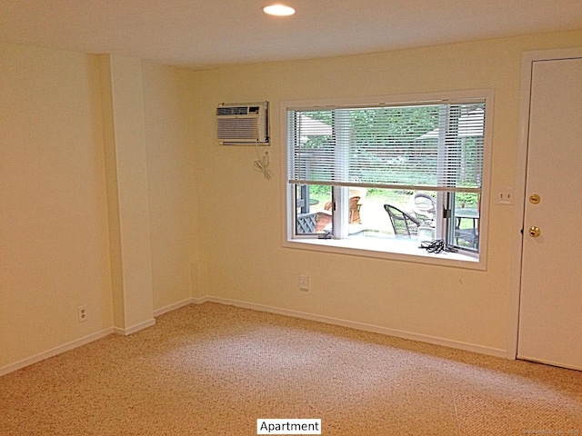 14 Live Oak Rd, Norwalk, CT 06851 - empty room with a wall mounted AC, light carpet, recessed lighting, and baseboards