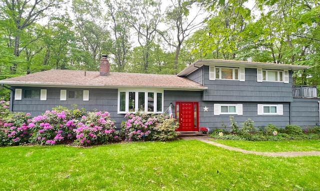 14 Live Oak Rd, Norwalk, CT 06851 - split level home featuring a chimney and a front yard