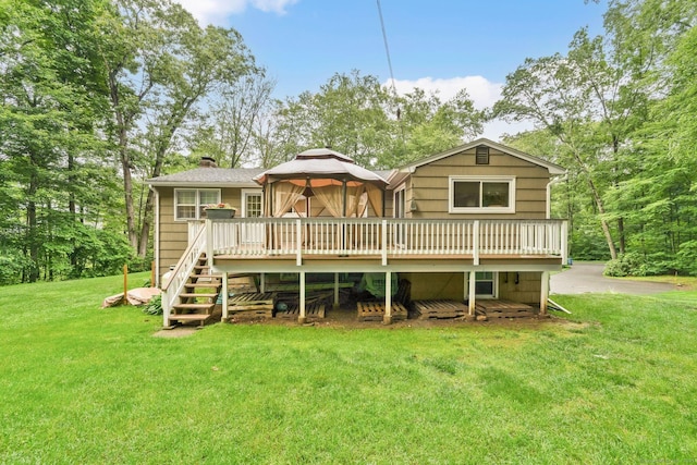 451 Jones Hollow Rd, Marlborough, CT 06447 - back of property with a gazebo, a deck, a chimney, a lawn, and stairway