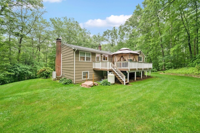 451 Jones Hollow Rd, Marlborough, CT 06447 - rear view of house featuring a gazebo, a chimney, a deck, and a yard