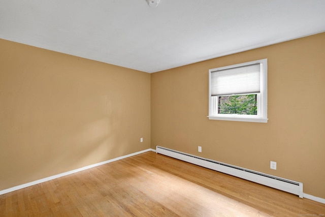 451 Jones Hollow Rd, Marlborough, CT 06447 - unfurnished room featuring a baseboard radiator and wood finished floors