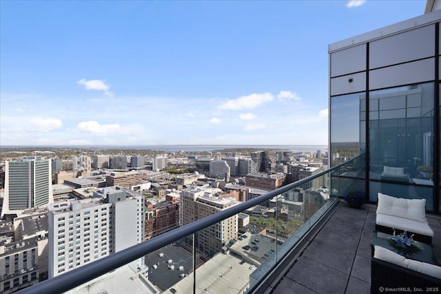 balcony featuring a view of city
