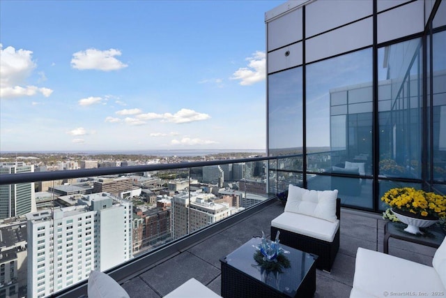 balcony featuring a view of city