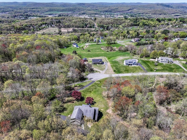 bird's eye view featuring a view of trees