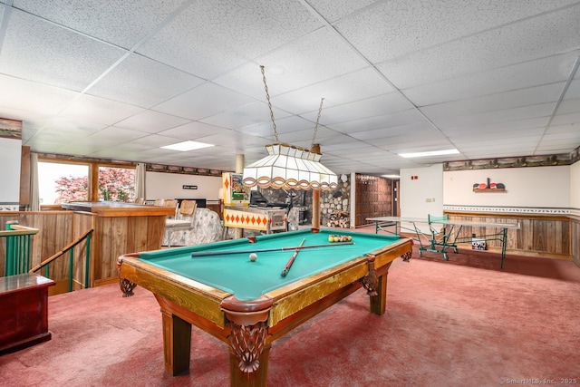 recreation room featuring carpet flooring, wooden walls, and pool table