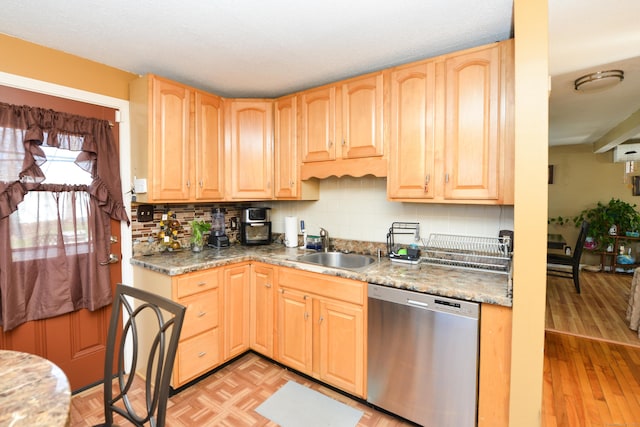 61 Kenyon Cir, New Britain, CT 06053 - kitchen with a sink, stainless steel dishwasher, light brown cabinets, and decorative backsplash