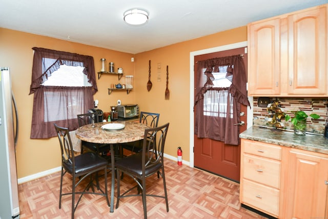 61 Kenyon Cir, New Britain, CT 06053 - dining room featuring a toaster and baseboards