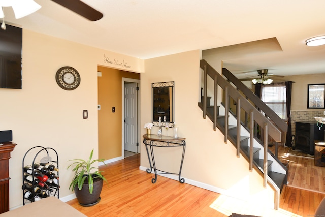 61 Kenyon Cir, New Britain, CT 06053 - staircase with baseboards, ceiling fan, and wood finished floors