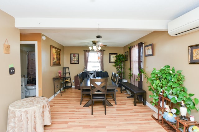 61 Kenyon Cir, New Britain, CT 06053 - dining space with light wood-style flooring, baseboards, ceiling fan, and an AC wall unit