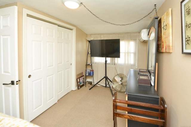 61 Kenyon Cir, New Britain, CT 06053 - carpeted bedroom with a closet and an AC wall unit