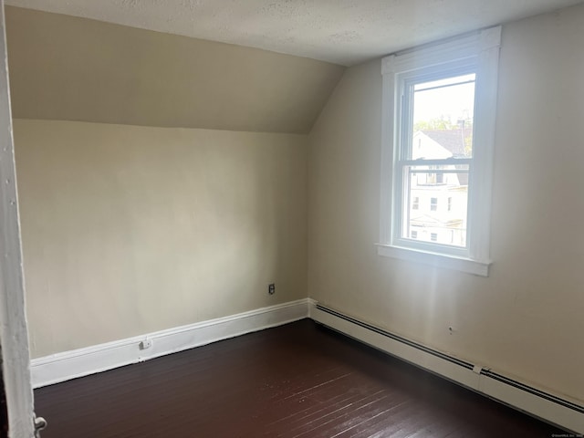 78-80 Cabot St, Hartford, CT 06154 - bonus room with baseboard heating, dark wood-style flooring, vaulted ceiling, baseboards, and a textured ceiling