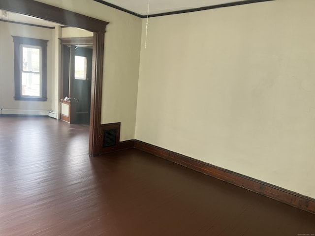 78-80 Cabot St, Hartford, CT 06154 - unfurnished room featuring dark wood-style flooring, baseboards, baseboard heating, and crown molding