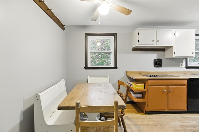 dining room featuring light wood-style flooring and ceiling fan