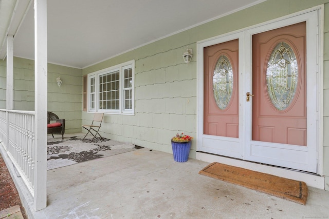 property entrance featuring covered porch