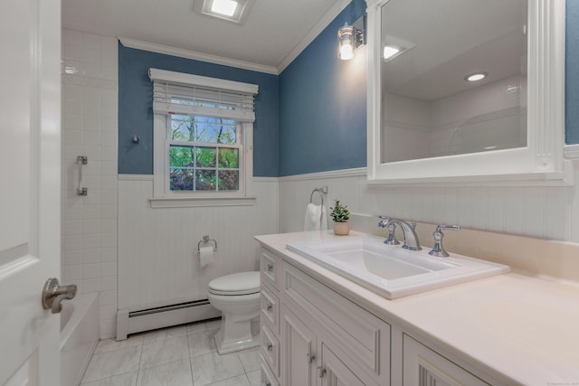 bathroom featuring baseboard heating, a wainscoted wall, toilet, vanity, and ornamental molding