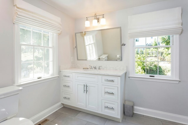 38 Heritage Hill Rd Unit 38, New Canaan, CT 06840 - bathroom with tile patterned floors, toilet, baseboards, and vanity