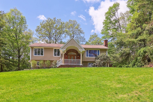 238 Walnut Tree Hill Rd, Shelton, CT 06484 - view of front of house with a chimney and a front lawn