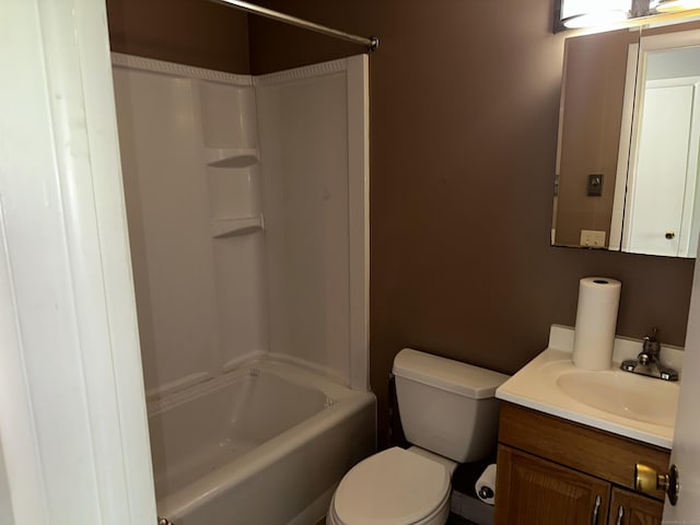 full bathroom with toilet, vanity, and shower / bathtub combination