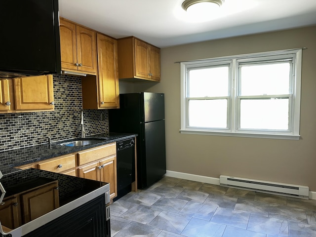 kitchen with black appliances, a baseboard heating unit, a sink, tasteful backsplash, and brown cabinets