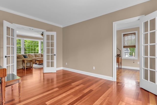 61 Governors Way, Madison, CT 06443 - unfurnished room with french doors, wood finished floors, crown molding, baseboards, and ceiling fan