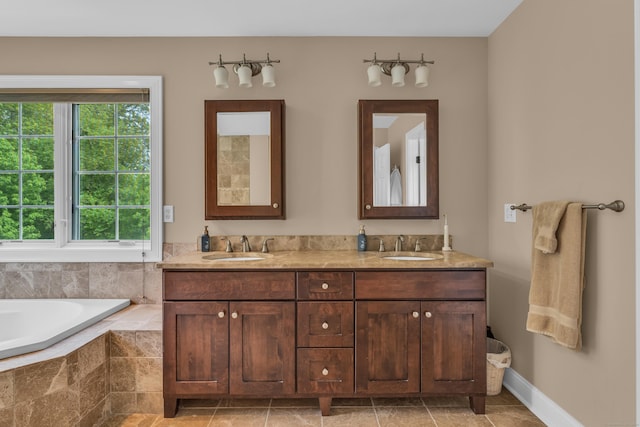 61 Governors Way, Madison, CT 06443 - bathroom featuring double vanity, a bath, and baseboards