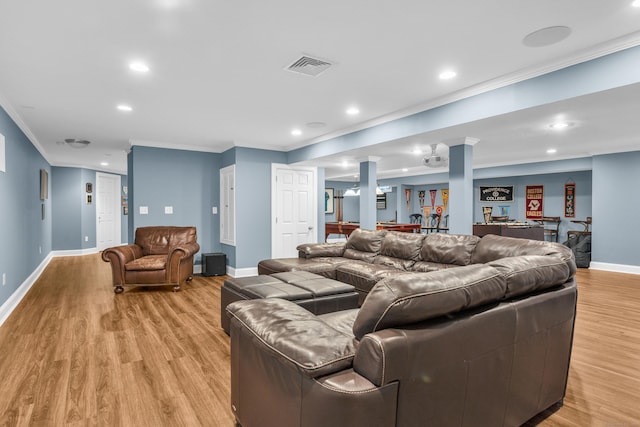 61 Governors Way, Madison, CT 06443 - living area with decorative columns, crown molding, light wood-style flooring, baseboards, and recessed lighting