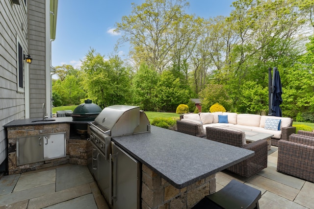 61 Governors Way, Madison, CT 06443 - view of patio featuring an outdoor hangout area, a sink, a grill, an outdoor kitchen, and view of scattered trees