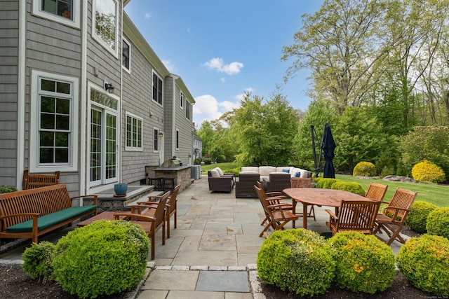 61 Governors Way, Madison, CT 06443 - view of patio / terrace with an outdoor living space and outdoor dining area