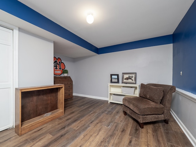 sitting room featuring wood finished floors and baseboards