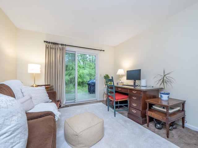 carpeted office with baseboards