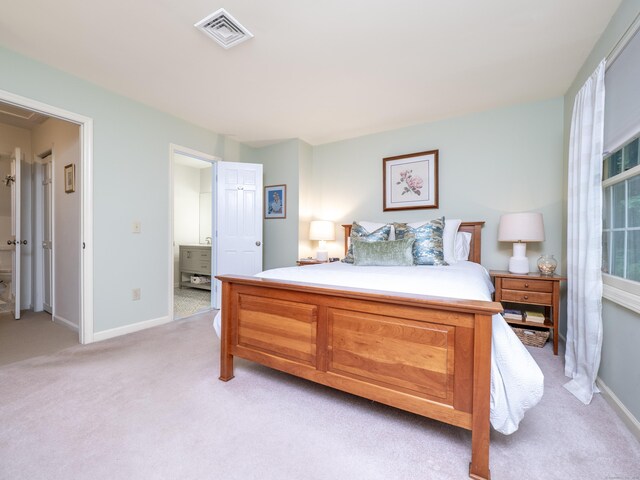 120 Prospect St Apt 2, Ridgefield, CT 06877 - bedroom with light carpet and ensuite bathroom
