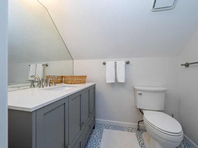 120 Prospect St Apt 2, Ridgefield, CT 06877 - bathroom featuring vanity and vaulted ceiling