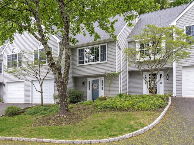 120 Prospect St Apt 2, Ridgefield, CT 06877 - view of front of property featuring an attached garage, asphalt driveway, and roof with shingles