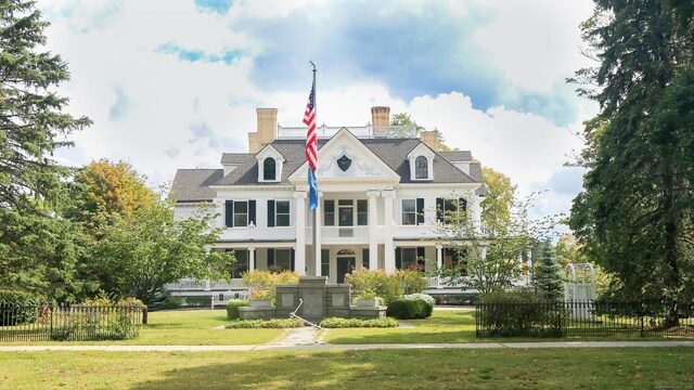 120 Prospect St Apt 2, Ridgefield, CT 06877 - neoclassical home featuring a chimney