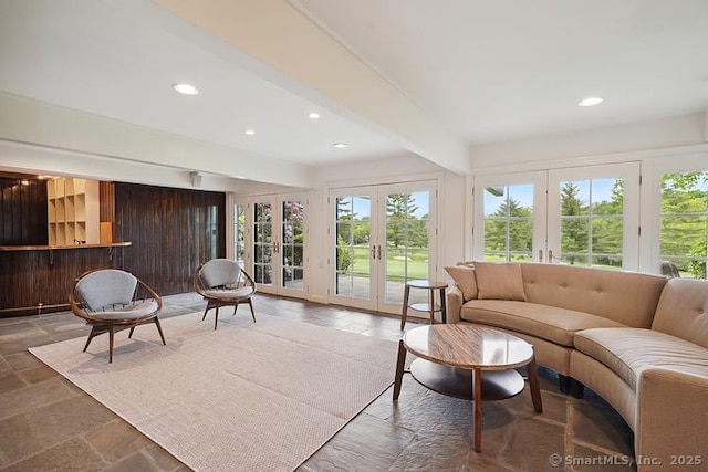 2 Aspetuck Hill Ln, Weston, CT 06883 - living room with french doors, recessed lighting, and beamed ceiling