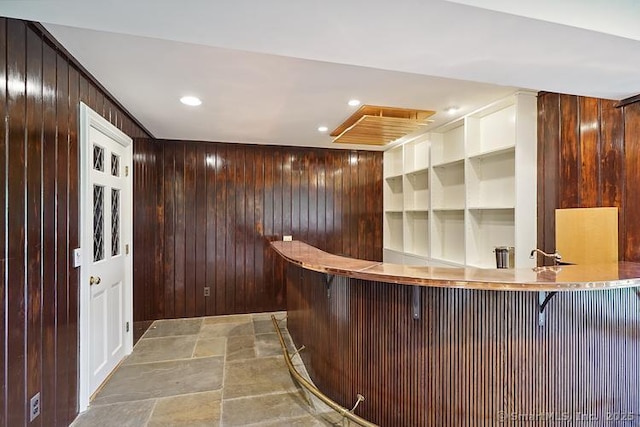 2 Aspetuck Hill Ln, Weston, CT 06883 - indoor dry bar featuring wooden walls, stone finish flooring, and recessed lighting