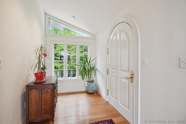 2 Aspetuck Hill Ln, Weston, CT 06883 - foyer with light wood-style floors, baseboards, and vaulted ceiling