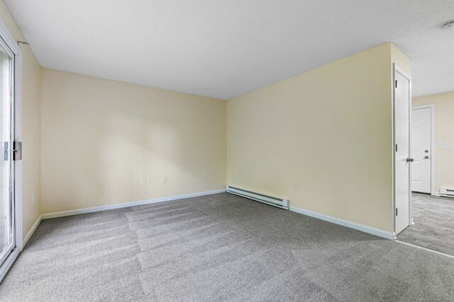 63 Summit St Apt 16, Manchester, CT 06040 - carpeted empty room with baseboard heating and baseboards